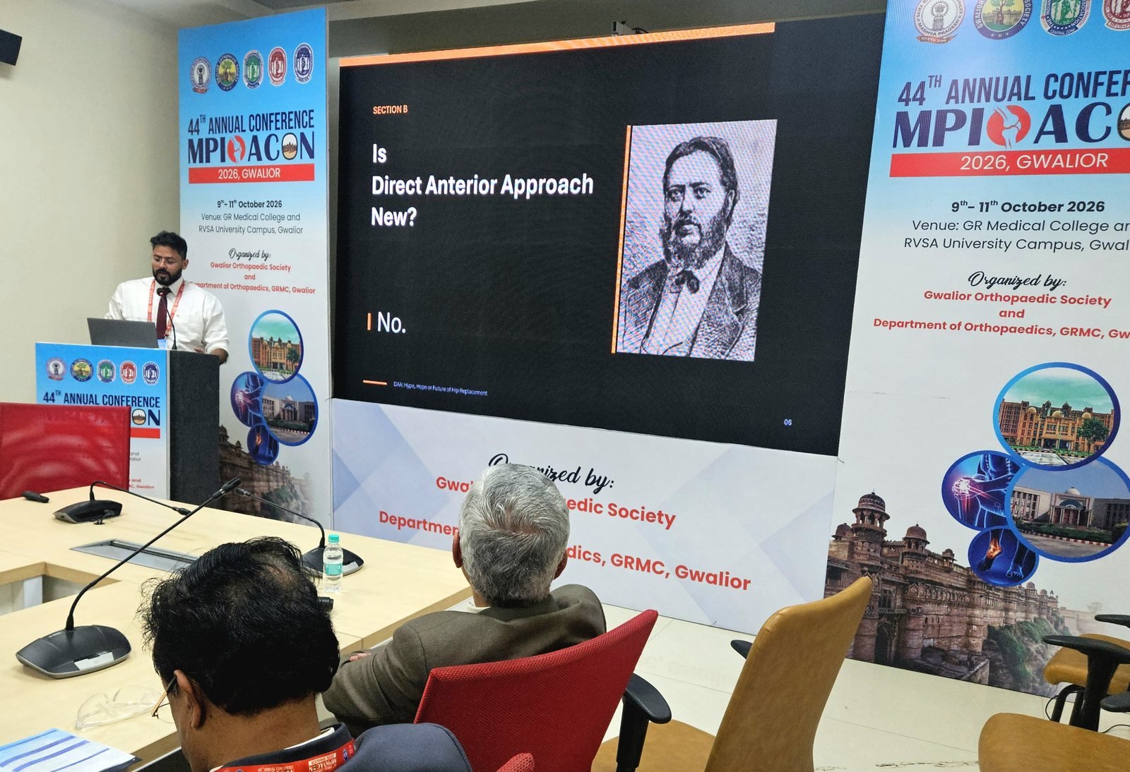 Dr. Anupam Khandelwal presenting a slide on the Direct Anterior Approach at MPIOACON 2026.