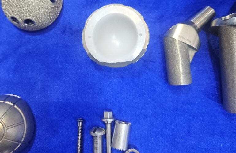 Medio-ventral recess hip replacement cup displayed at Current Concepts in Arthroplasty (CCA) 2026, AIIMS New Delhi, highlighting an advanced acetabular cup design for Total Hip Replacement Surgery.